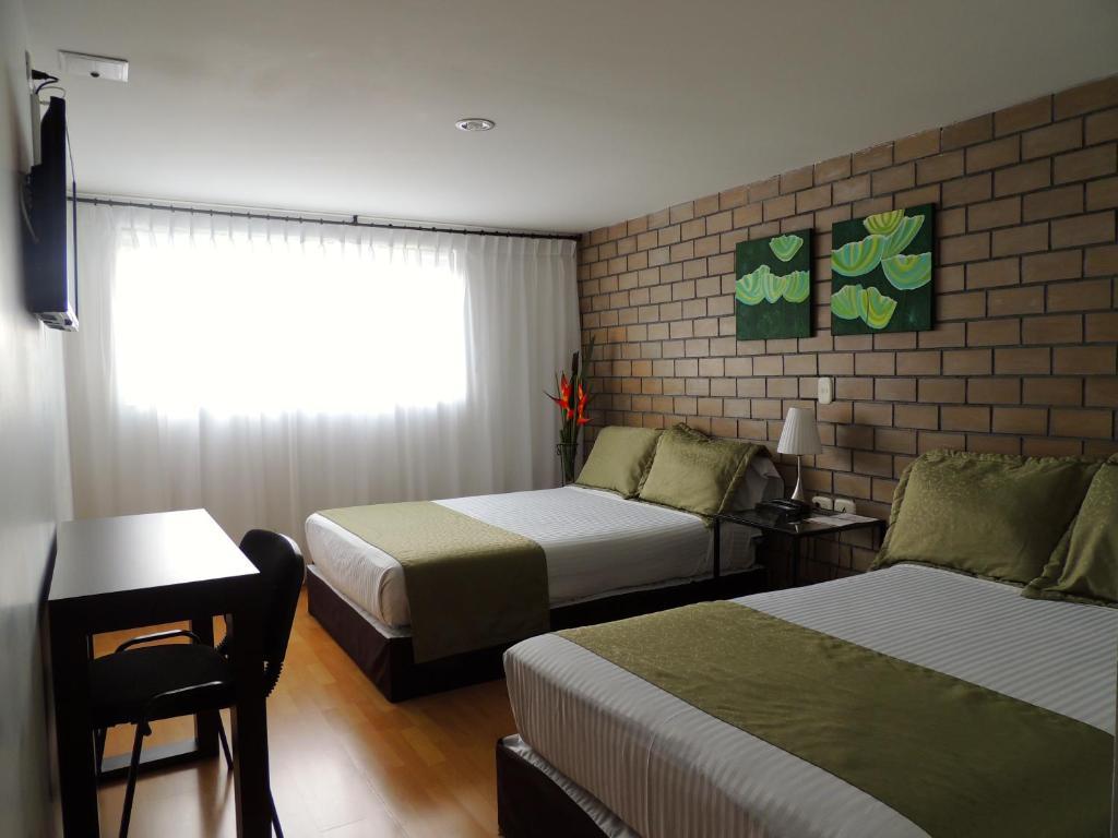 Hotel Portal De Milán Manizales Quarto foto